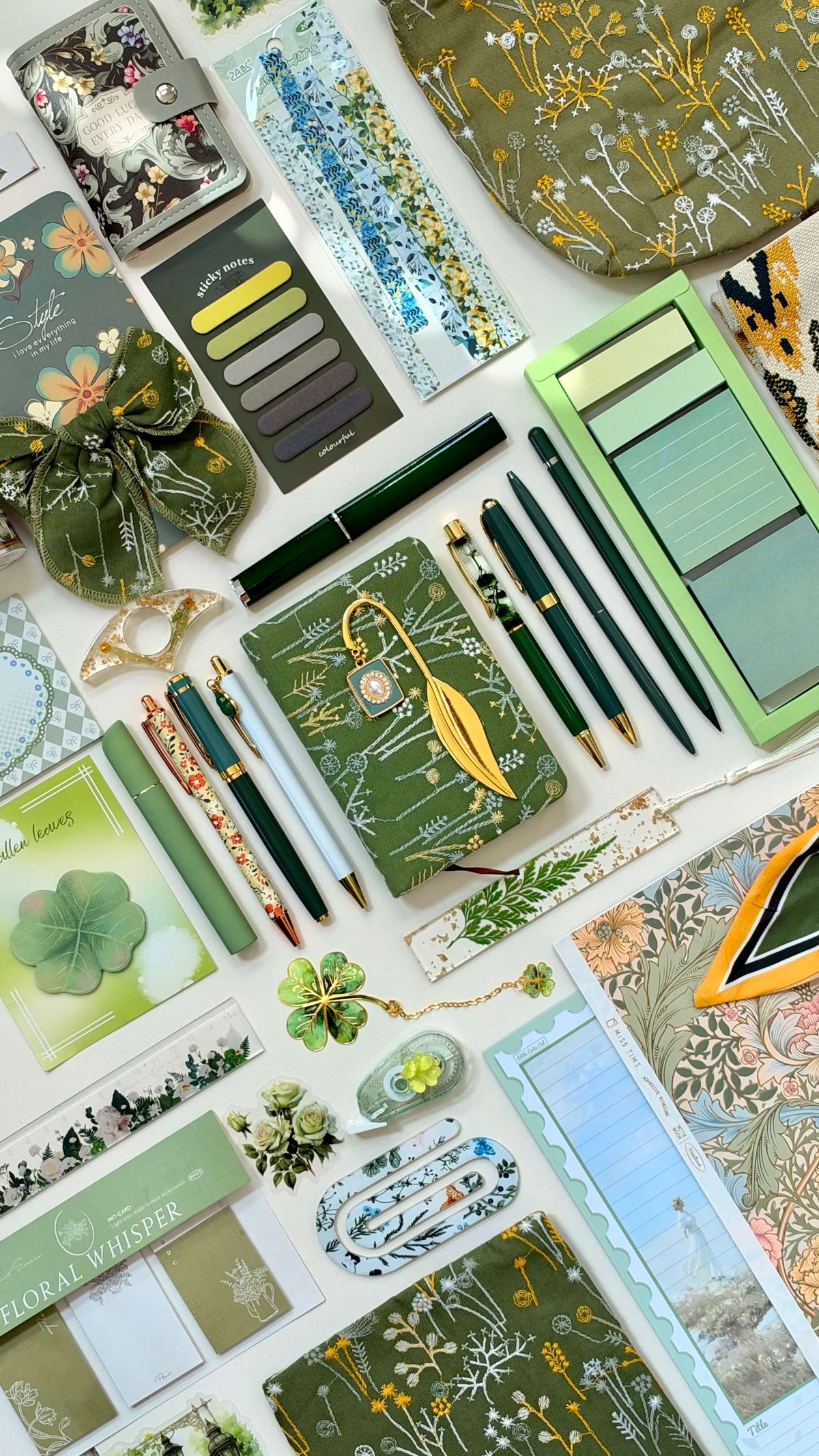 Green Vintage Velvet Edition bookish bundle with an embroidered pouch, floral journal, pens, bookmarks and sticky notes.